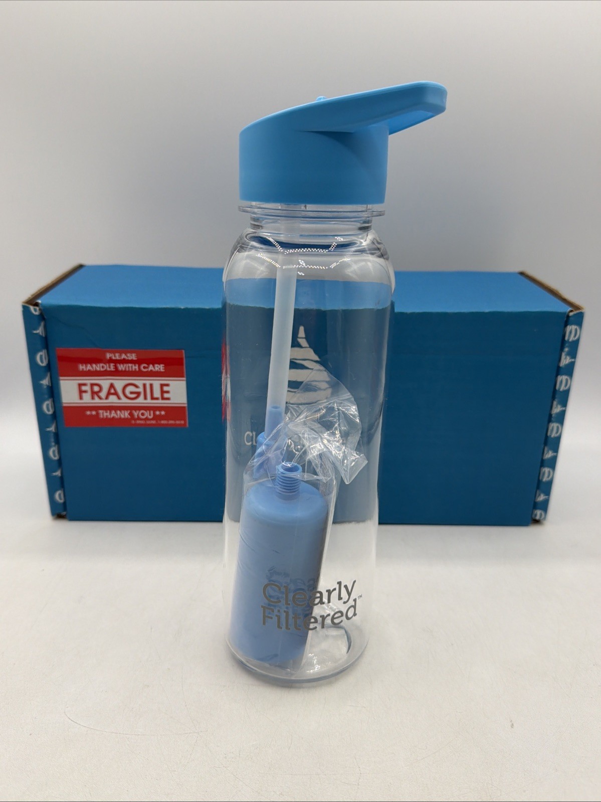 ClearlyFiltered Tritan 24 oz Water Filtration Bottle w/straw and filter open box