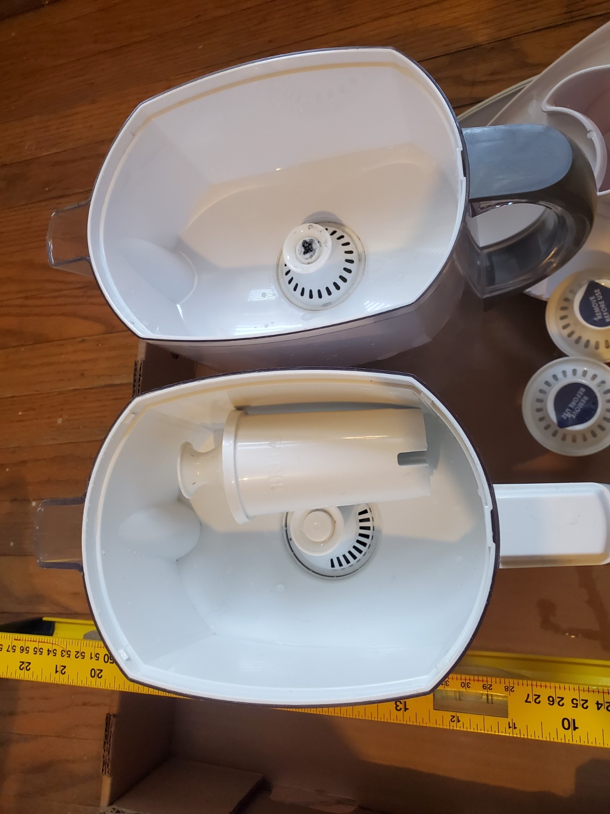 Two Brita filter pitchers with 2 extra new filters