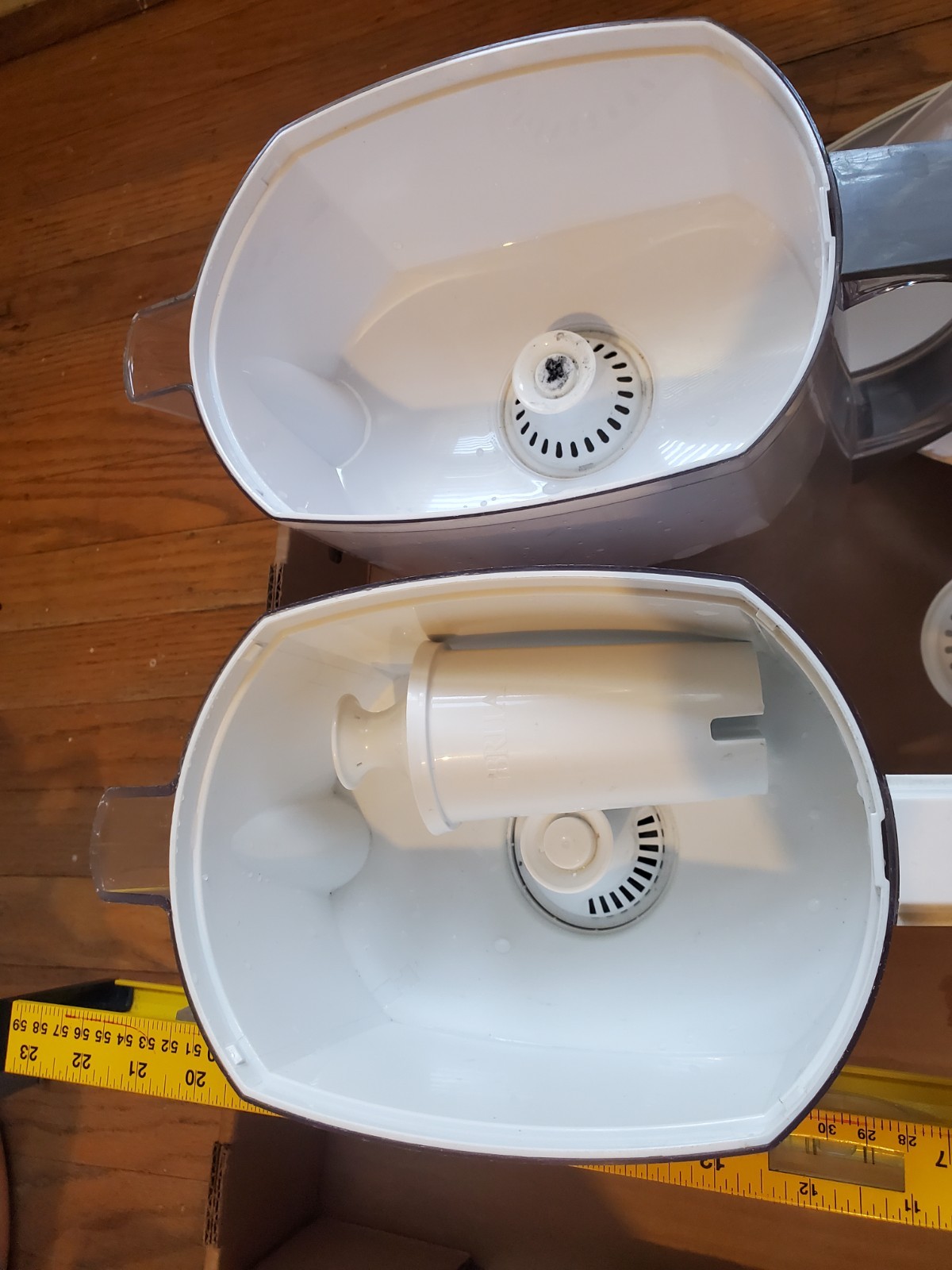 Two Brita filter pitchers with 2 extra new filters