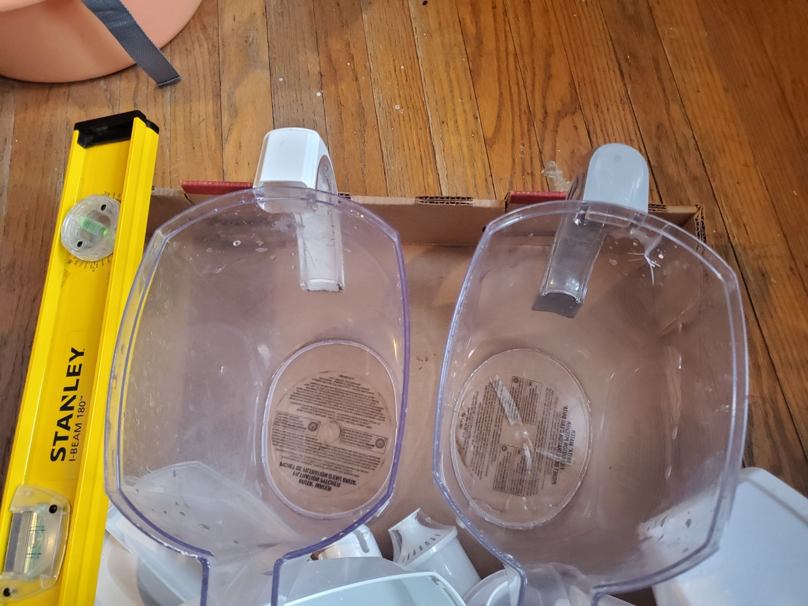 Two Brita filter pitchers with 2 extra new filters