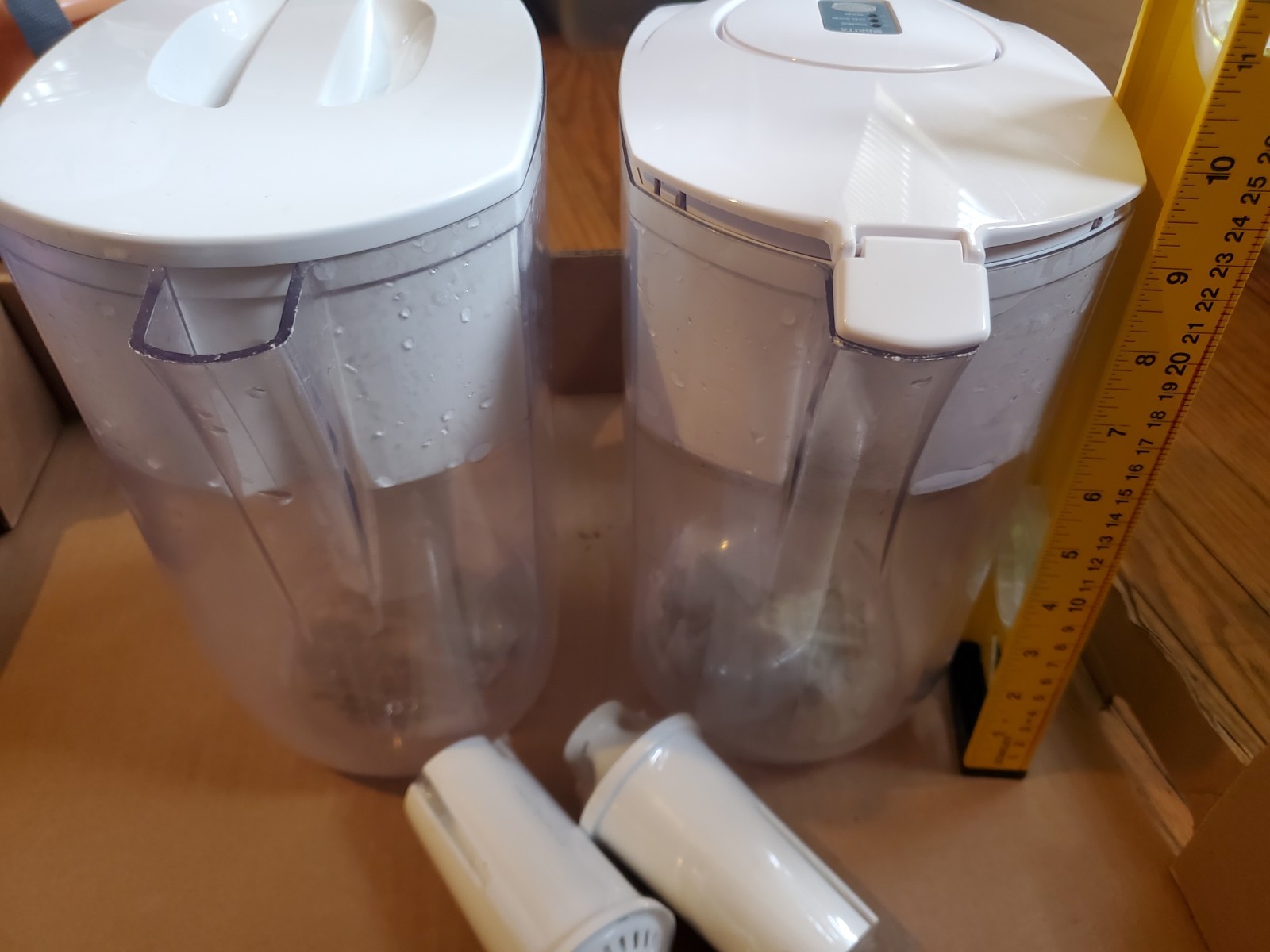 Two Brita filter pitchers with 2 extra new filters