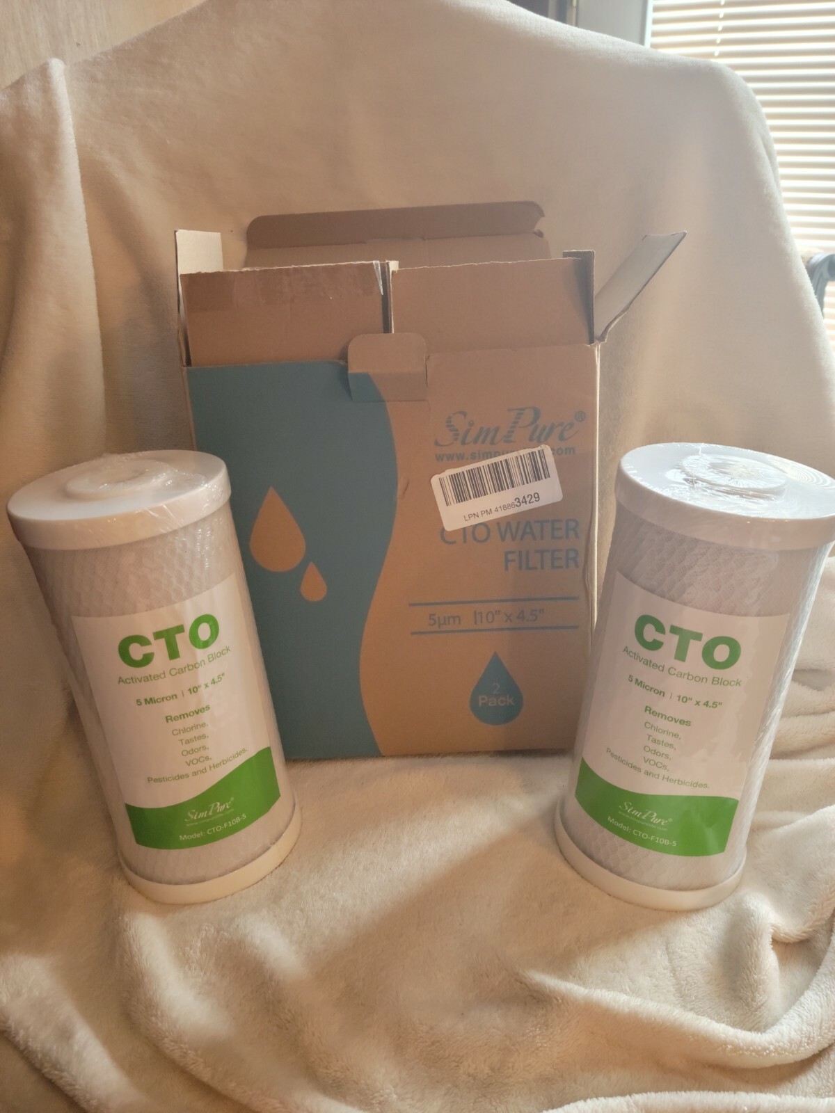 Simpure Water Filter 10×4.5 2 pk new in shrink wrap. Opened box to photo. CTO
