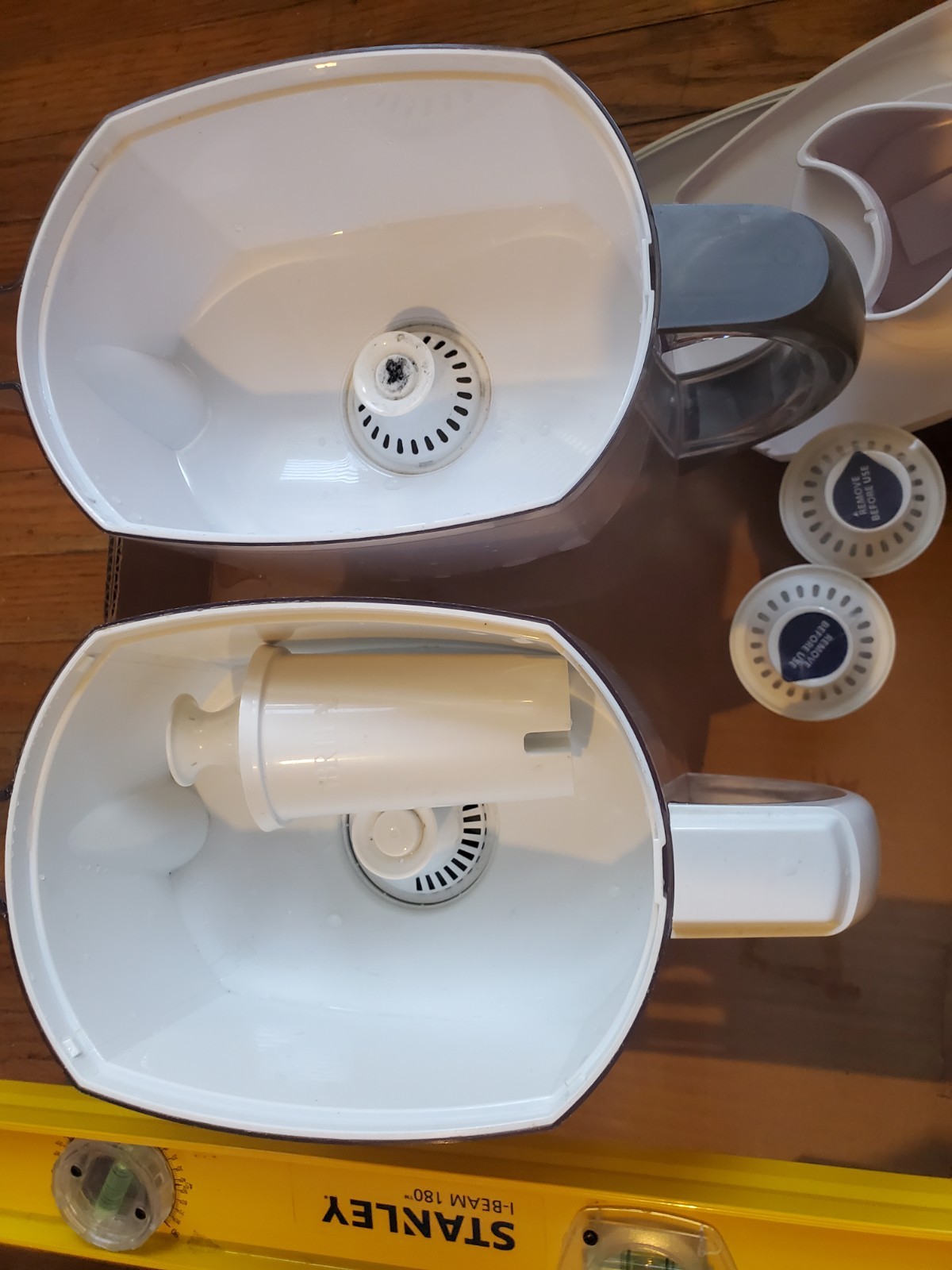 Two Brita filter pitchers with 2 extra new filters